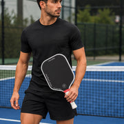 Player wearing PIVARO® Men's Pickleball T-Shirt during a pickleball match